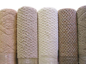 Bound carpet remnants make inexpensive area rugs.