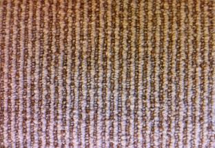 Natural wool rug with row sisal weave.